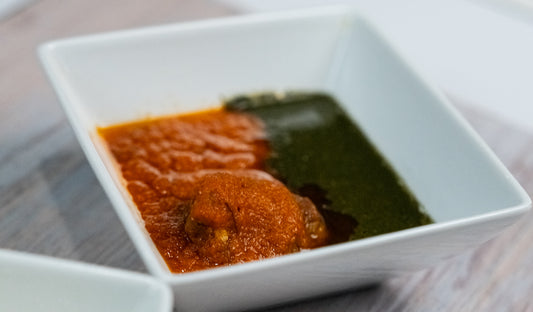 Fufu with ewedu soup and red stew