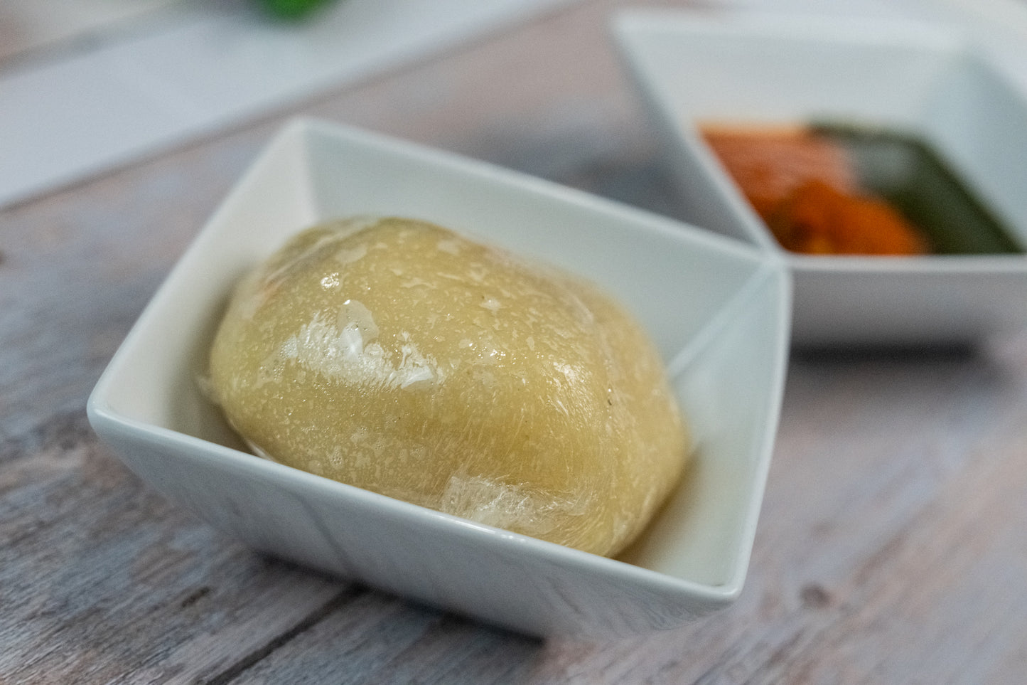 Fufu with ewedu soup and red stew